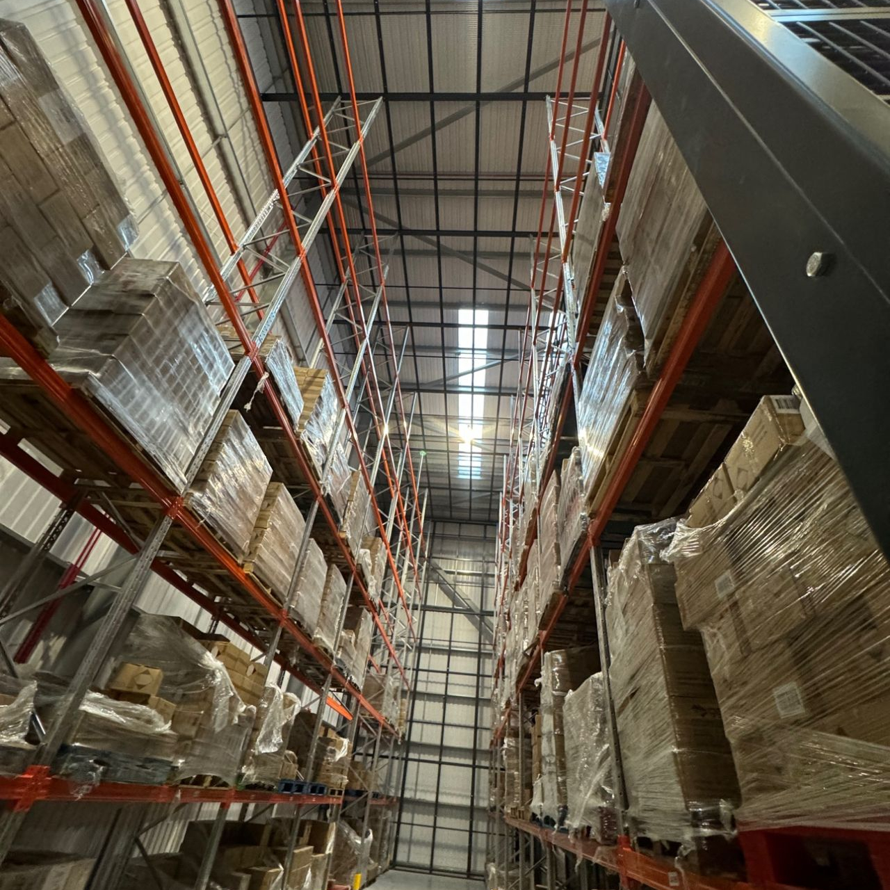 Aerosol caging within pallet racking